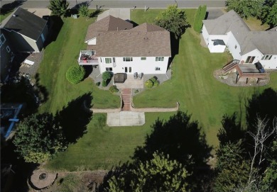 Nestled in a serene neighborhood, this meticulously maintained on Chisago Lakes Golf Course in Minnesota - for sale on GolfHomes.com, golf home, golf lot