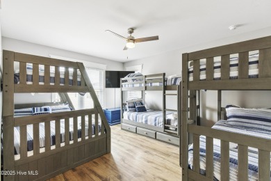 Luxurious Island Living in Sunset Beach: A Stunning 6-Bedroom, 6 on Oyster Bay Golf Links in North Carolina - for sale on GolfHomes.com, golf home, golf lot