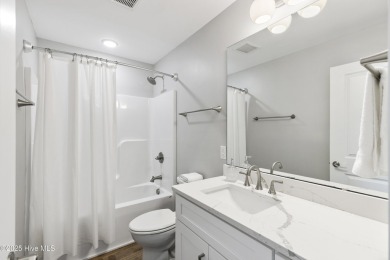 Luxurious Island Living in Sunset Beach: A Stunning 6-Bedroom, 6 on Oyster Bay Golf Links in North Carolina - for sale on GolfHomes.com, golf home, golf lot