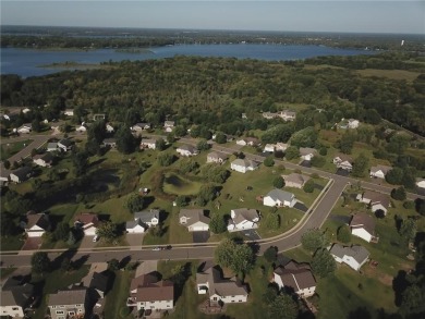 Nestled in a serene neighborhood, this meticulously maintained on Chisago Lakes Golf Course in Minnesota - for sale on GolfHomes.com, golf home, golf lot