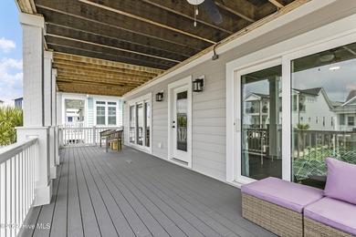 Luxurious Island Living in Sunset Beach: A Stunning 6-Bedroom, 6 on Oyster Bay Golf Links in North Carolina - for sale on GolfHomes.com, golf home, golf lot