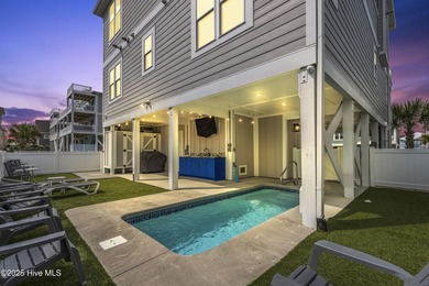 Luxurious Island Living in Sunset Beach: A Stunning 6-Bedroom, 6 on Oyster Bay Golf Links in North Carolina - for sale on GolfHomes.com, golf home, golf lot