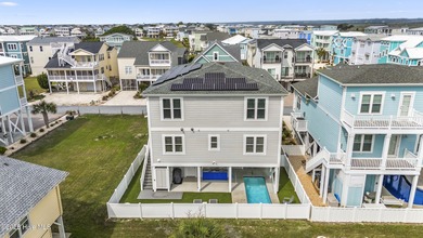 Luxurious Island Living in Sunset Beach: A Stunning 6-Bedroom, 6 on Oyster Bay Golf Links in North Carolina - for sale on GolfHomes.com, golf home, golf lot