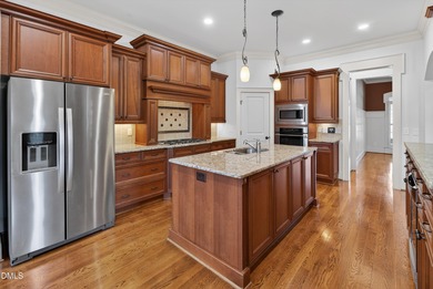 This stunning Heritage home built by Homes By Dickerson offers a on Heritage Golf Club in North Carolina - for sale on GolfHomes.com, golf home, golf lot