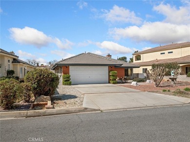 Welcome to this beautifully maintained home located at 12860 on Spring Valley Lake Country Club in California - for sale on GolfHomes.com, golf home, golf lot