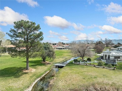 Welcome to this beautifully maintained home located at 12860 on Spring Valley Lake Country Club in California - for sale on GolfHomes.com, golf home, golf lot