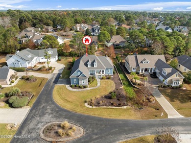 This beautiful coastal home located in St. James Plantation is on Members Club At St. James Plantation in North Carolina - for sale on GolfHomes.com, golf home, golf lot