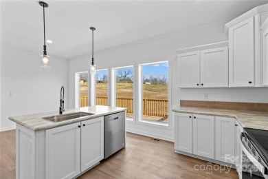 Located in the River Rock neighborhood, this brand new home on River Oaks Country Club in North Carolina - for sale on GolfHomes.com, golf home, golf lot