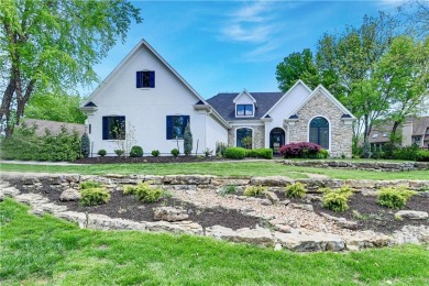 This gorgeous complete remodel by Evan Talan homes shows like a on Loch Lloyd Country Club in Missouri - for sale on GolfHomes.com, golf home, golf lot