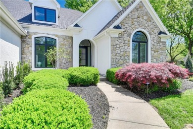 This gorgeous complete remodel by Evan Talan homes shows like a on Loch Lloyd Country Club in Missouri - for sale on GolfHomes.com, golf home, golf lot