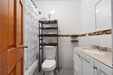 Welcome to this beautifully maintained, solid brick two-family on Dyker Beach Golf Course in New York - for sale on GolfHomes.com, golf home, golf lot