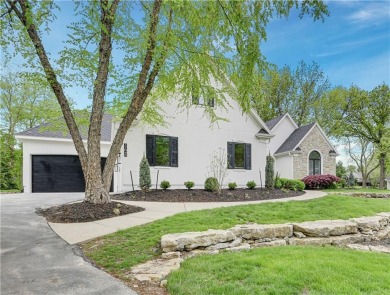This gorgeous complete remodel by Evan Talan homes shows like a on Loch Lloyd Country Club in Missouri - for sale on GolfHomes.com, golf home, golf lot