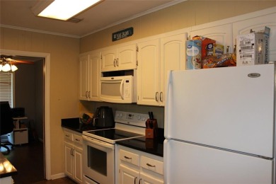Welcome home to 1314 E Todd Street, in a prime location right on Pine Hills Country Club in Louisiana - for sale on GolfHomes.com, golf home, golf lot