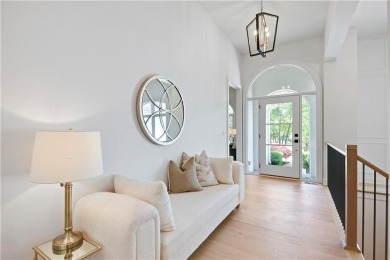 This gorgeous complete remodel by Evan Talan homes shows like a on Loch Lloyd Country Club in Missouri - for sale on GolfHomes.com, golf home, golf lot