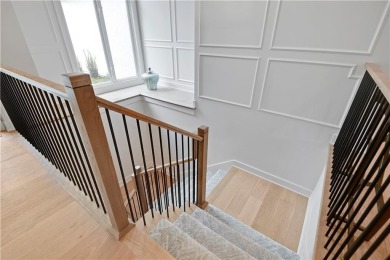 This gorgeous complete remodel by Evan Talan homes shows like a on Loch Lloyd Country Club in Missouri - for sale on GolfHomes.com, golf home, golf lot