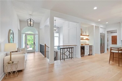 This gorgeous complete remodel by Evan Talan homes shows like a on Loch Lloyd Country Club in Missouri - for sale on GolfHomes.com, golf home, golf lot