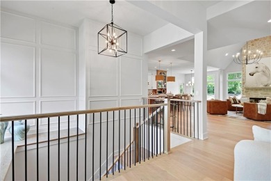 This gorgeous complete remodel by Evan Talan homes shows like a on Loch Lloyd Country Club in Missouri - for sale on GolfHomes.com, golf home, golf lot
