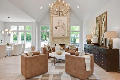 This gorgeous complete remodel by Evan Talan homes shows like a on Loch Lloyd Country Club in Missouri - for sale on GolfHomes.com, golf home, golf lot
