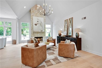 This gorgeous complete remodel by Evan Talan homes shows like a on Loch Lloyd Country Club in Missouri - for sale on GolfHomes.com, golf home, golf lot