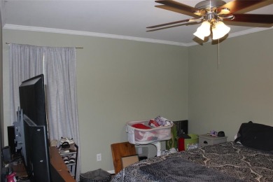 Welcome home to 1314 E Todd Street, in a prime location right on Pine Hills Country Club in Louisiana - for sale on GolfHomes.com, golf home, golf lot