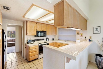 Best Location!  This 2 Bedroom, 2 bath condo overlooks a very on Palm Desert Resort Country Club in California - for sale on GolfHomes.com, golf home, golf lot