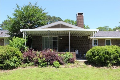 Welcome home to 1314 E Todd Street, in a prime location right on Pine Hills Country Club in Louisiana - for sale on GolfHomes.com, golf home, golf lot