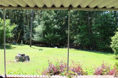 Welcome home to 1314 E Todd Street, in a prime location right on Pine Hills Country Club in Louisiana - for sale on GolfHomes.com, golf home, golf lot