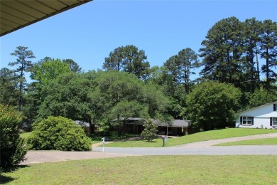 Welcome home to 1314 E Todd Street, in a prime location right on Pine Hills Country Club in Louisiana - for sale on GolfHomes.com, golf home, golf lot