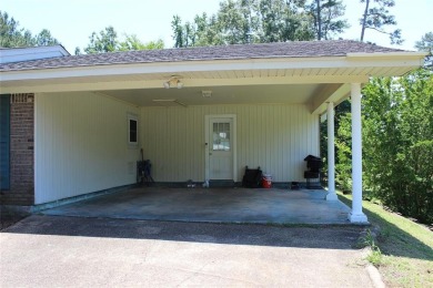Welcome home to 1314 E Todd Street, in a prime location right on Pine Hills Country Club in Louisiana - for sale on GolfHomes.com, golf home, golf lot