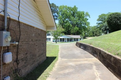 Welcome home to 1314 E Todd Street, in a prime location right on Pine Hills Country Club in Louisiana - for sale on GolfHomes.com, golf home, golf lot