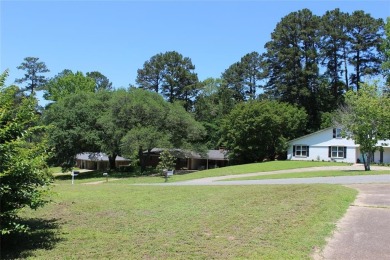 Welcome home to 1314 E Todd Street, in a prime location right on Pine Hills Country Club in Louisiana - for sale on GolfHomes.com, golf home, golf lot