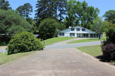 Welcome home to 1314 E Todd Street, in a prime location right on Pine Hills Country Club in Louisiana - for sale on GolfHomes.com, golf home, golf lot