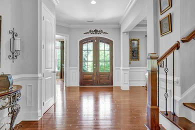 Welcome to an exceptional custom home nestled on nearly an acre on Chapel Ridge Golf Club in North Carolina - for sale on GolfHomes.com, golf home, golf lot