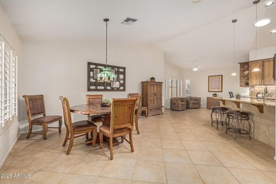 This immaculate, well-maintained home is nestled in a quiet on Tuscany Falls At Pebble Creek in Arizona - for sale on GolfHomes.com, golf home, golf lot
