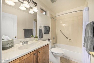 This immaculate, well-maintained home is nestled in a quiet on Tuscany Falls At Pebble Creek in Arizona - for sale on GolfHomes.com, golf home, golf lot