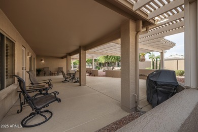 This immaculate, well-maintained home is nestled in a quiet on Tuscany Falls At Pebble Creek in Arizona - for sale on GolfHomes.com, golf home, golf lot
