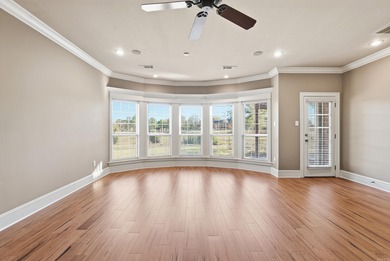 Experience stunning golf course views from this beautiful home on Centennial Valley Golf Course in Arkansas - for sale on GolfHomes.com, golf home, golf lot