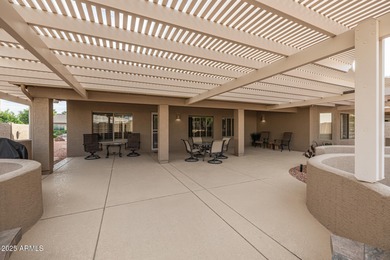 This immaculate, well-maintained home is nestled in a quiet on Tuscany Falls At Pebble Creek in Arizona - for sale on GolfHomes.com, golf home, golf lot