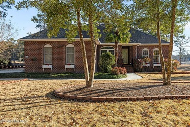 This all-brick ranch, 3-bedroom, 2-bathroom home has been on North Shore Country Club in North Carolina - for sale on GolfHomes.com, golf home, golf lot