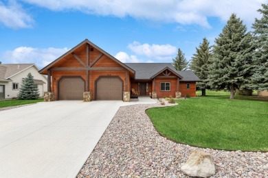 This superb single-level home overlooks the pond on the 14th on Eagle Bend Golf Course in Montana - for sale on GolfHomes.com, golf home, golf lot