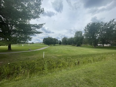 This vacant lot is an excellent opportunity to build your dream on Sugar Springs Country Club in Michigan - for sale on GolfHomes.com, golf home, golf lot