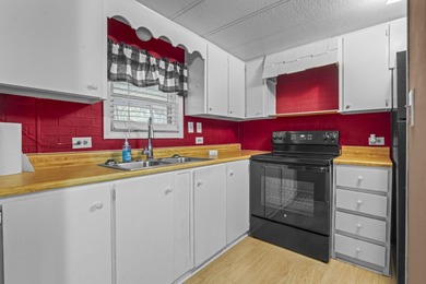 Tucked inside the charming Ocean Pines 55+ community in Murrells on Indigo Creek Golf Club in South Carolina - for sale on GolfHomes.com, golf home, golf lot