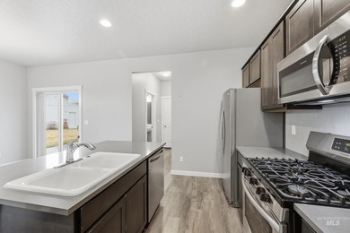 Welcome to this well-appointed three-bedroom on Eagle Legacy Golf Course in Idaho - for sale on GolfHomes.com, golf home, golf lot