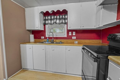 Tucked inside the charming Ocean Pines 55+ community in Murrells on Indigo Creek Golf Club in South Carolina - for sale on GolfHomes.com, golf home, golf lot