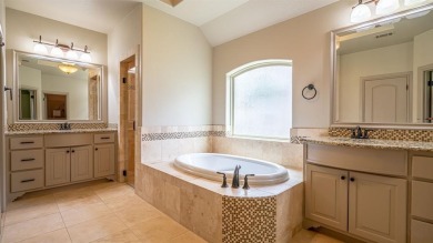 This lakefront home is located in the prestigious gated on Harbor Lakes Golf Club in Texas - for sale on GolfHomes.com, golf home, golf lot