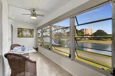 Nestled in Abbey Village, Delray Beach, this beautifully fully on Marina Lakes Golf Course in Florida - for sale on GolfHomes.com, golf home, golf lot