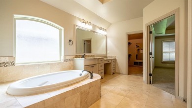 This lakefront home is located in the prestigious gated on Harbor Lakes Golf Club in Texas - for sale on GolfHomes.com, golf home, golf lot