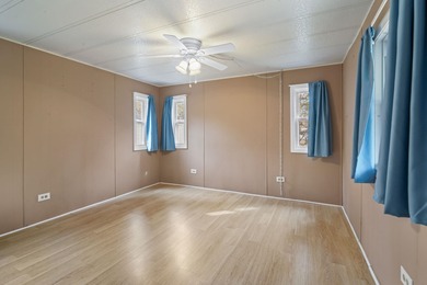 Tucked inside the charming Ocean Pines 55+ community in Murrells on Indigo Creek Golf Club in South Carolina - for sale on GolfHomes.com, golf home, golf lot