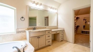 This lakefront home is located in the prestigious gated on Harbor Lakes Golf Club in Texas - for sale on GolfHomes.com, golf home, golf lot