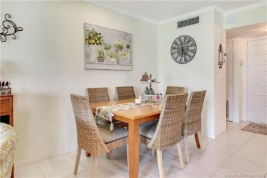 Gorgeous UPDATED Kitchen and Baths. Impact windows and tile on Martin County Golf Course in Florida - for sale on GolfHomes.com, golf home, golf lot